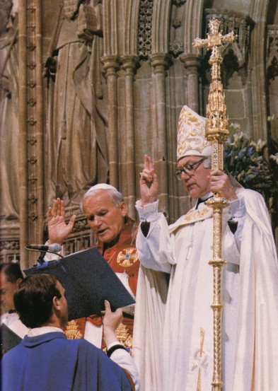 More photos of John Paul II worshipping and communing with the schismatic layman who headed the Anglican Sect